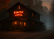 The Beacon Hotel glowing at dusk with a misty, haunted atmosphere in rural Butler County, Pennsylvania